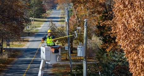 Workers replacing obsolete wiring in Muskegon and Muskegon Heights 